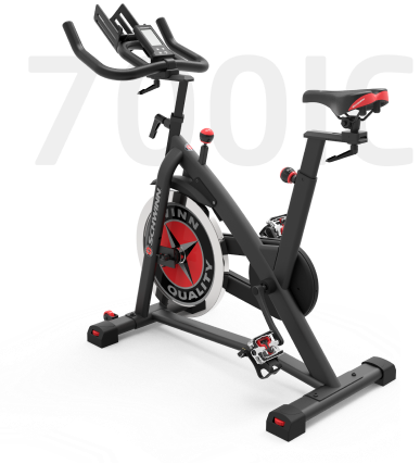 Foto da Bike Spinning Schwinn com um texto decorativo '700C' ao fundo.
